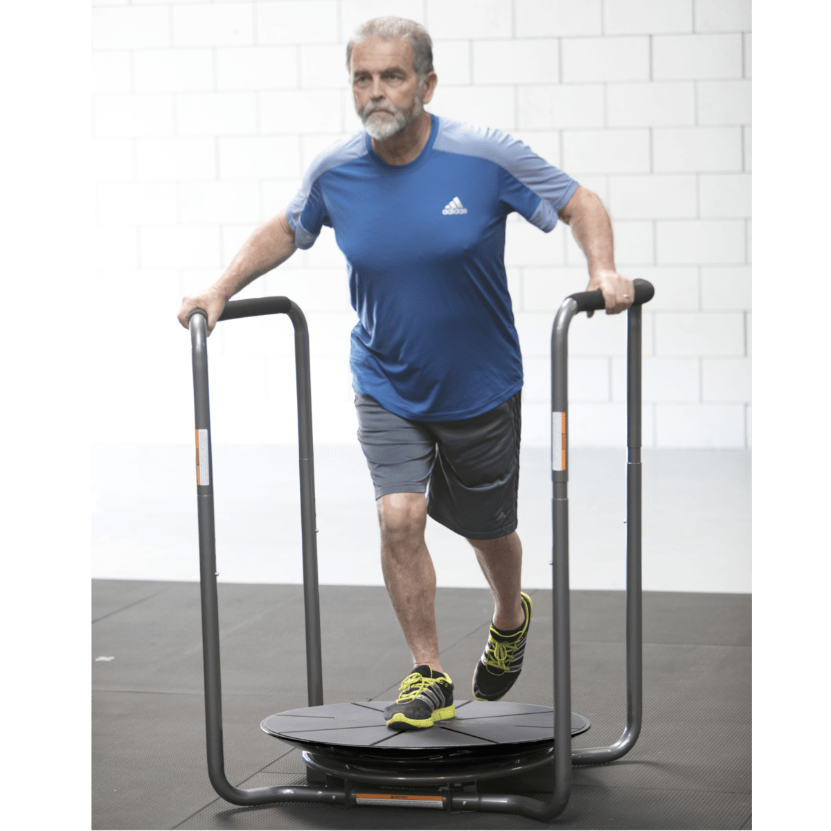 Middle aged man working out using the Core-Tex Duel Reactive Trainer